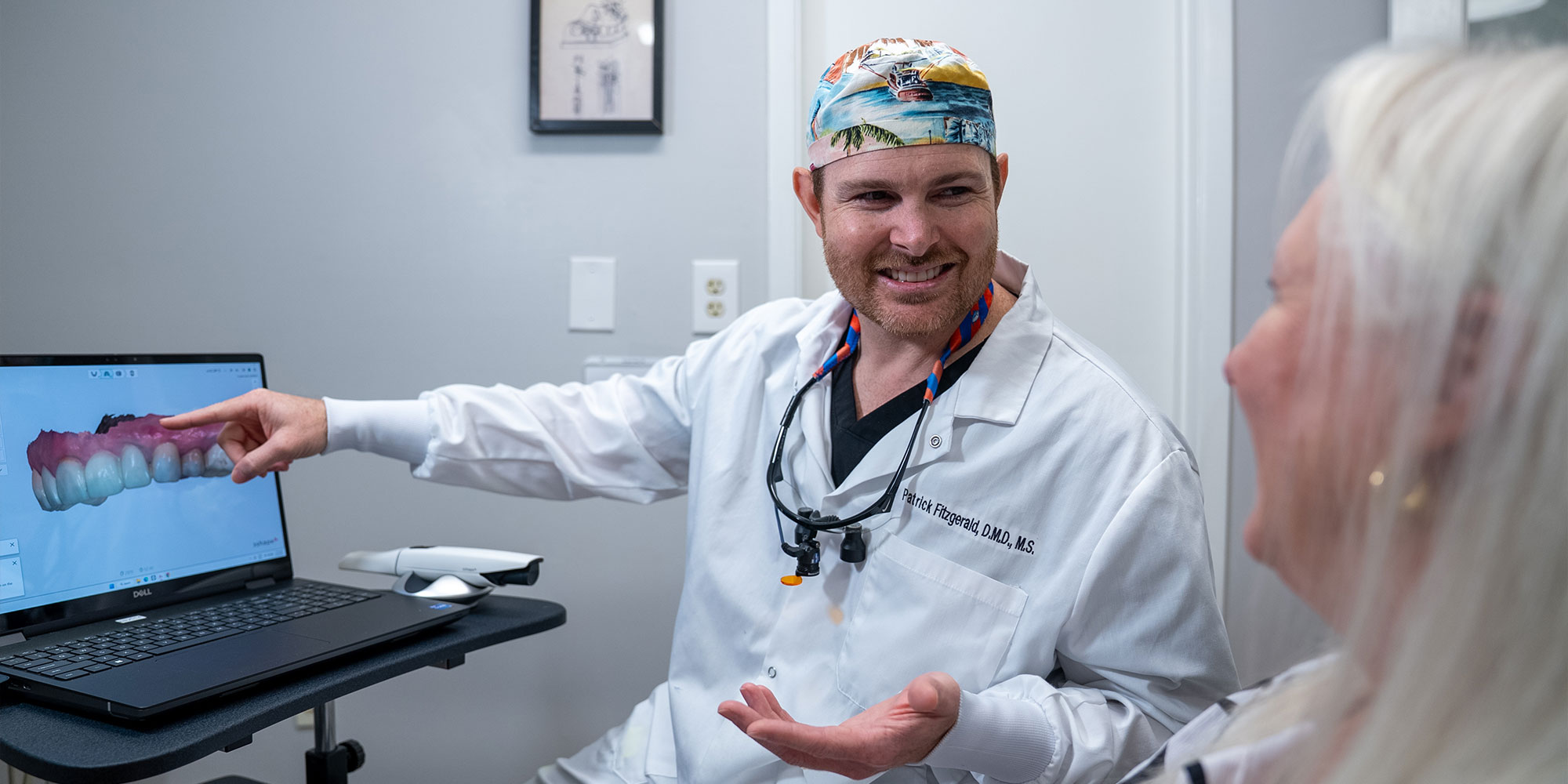 doctor going over dental procedure information