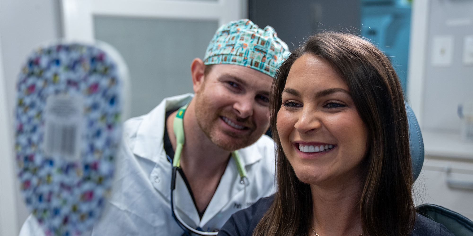 Dental specialist smiling with instruments